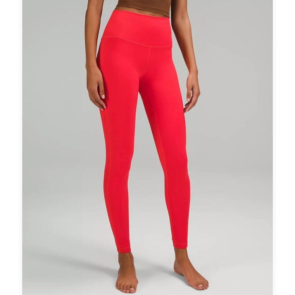 lululemon athletica High-Rise Solar Orange Leggings.